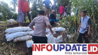 Kapolsek Belawa Imbau Warga Waspada Banjir, Polisi Turun Kerja Bakti Antisipasi Tanggul Jebol